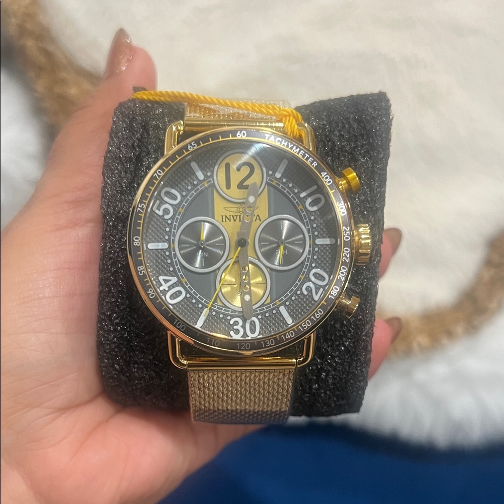 Invicta Gold and Black Chronograph Watch